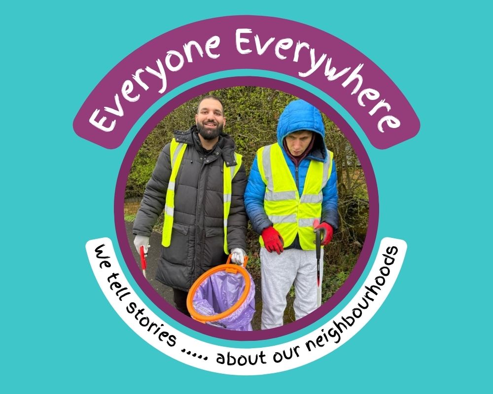 Two men in hi vis jackets litter-picking
