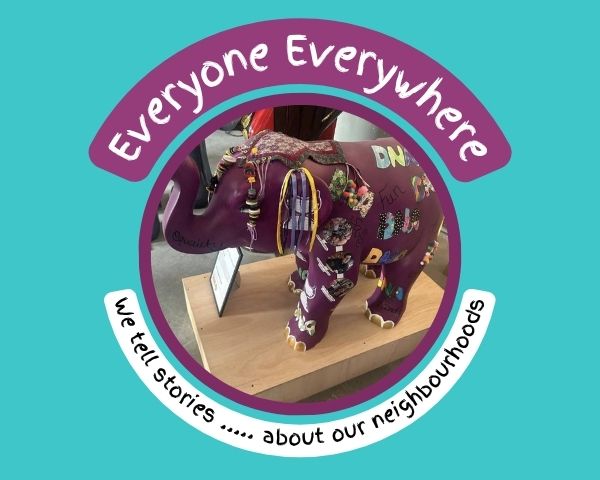 Painted model elephant in purples and golds